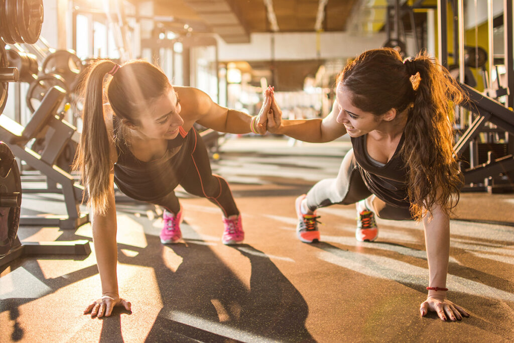women friends pushups